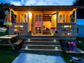 Log cabin retreat and luxury bell tent